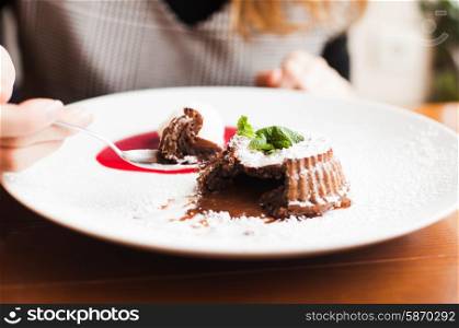 Chocolate fondant with berry sause and vanilla ice cream