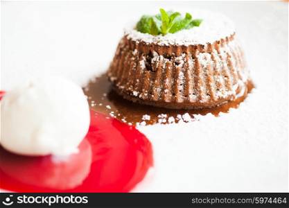 Chocolate fondant with berry sause and vanilla ice cream. The Chocolate fondant