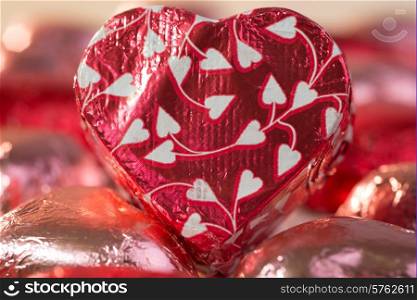 Chocolate Heart with wrapping paper, symbolizing love.
