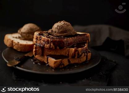 Chocolate ice cream on a slice of Toast. . Chocolate ice cream on toast. 
