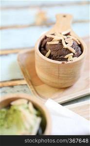 chocolate ice cream on wood background