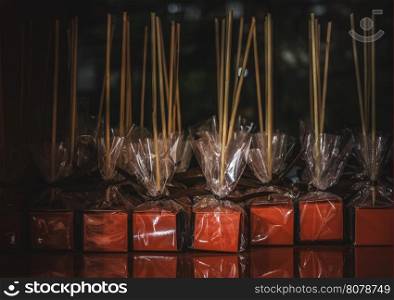 Chocolate lollipops on a shelf in a store