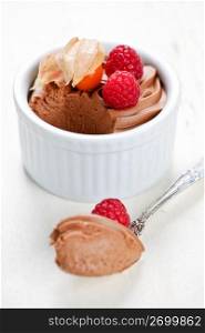 Chocolate mousse dessert with a spoon