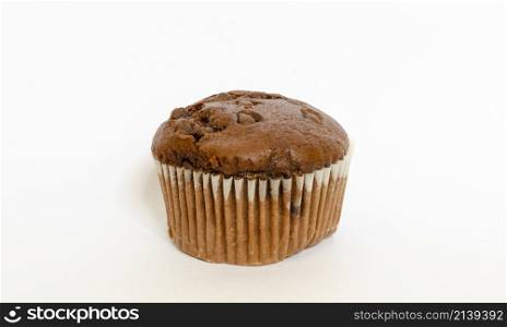 chocolate muffin with chocloate drops isolated on white background