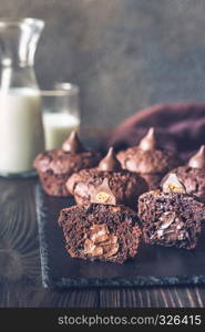 Chocolate muffins on the black stone board