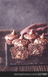 Chocolate muffins on the black stone board