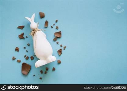 chocolate pieces around bunny statuette