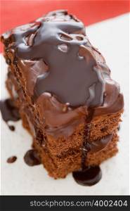 Chocolate sauce covering a cake