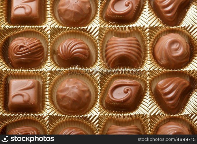 Chocolate sweets in box close up