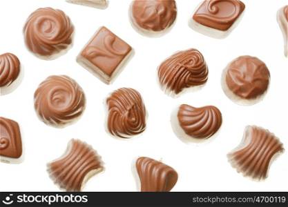 Chocolate sweets on white close up