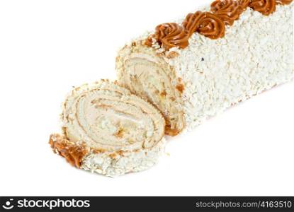 Chocolate Swiss roll closeup isolated on a white background