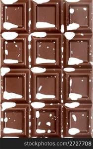 Chocolate tile with milk splashes