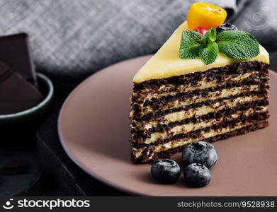 chocolate vanilla cake with berries on plate