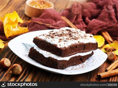 chocolate wafer on plate and on a table