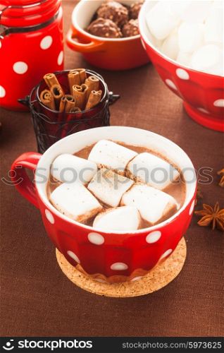 Chocolate with marshmallow in red polka dot cup. Chocolate with marshmallow