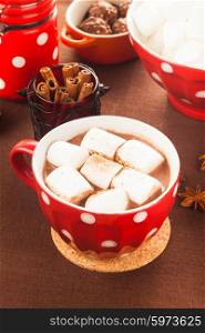 Chocolate with marshmallow in red polka dot cup. Chocolate with marshmallow