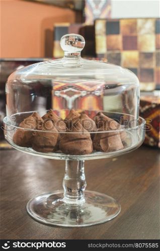 Chocolates in a luxurious glass dish. Various sweets. Bulgaria