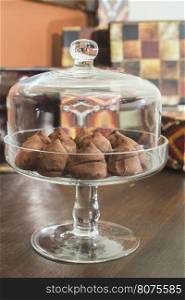 Chocolates in a luxurious glass dish. Various sweets. Bulgaria