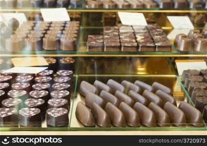 Chocolates on booth. Chocolate shop