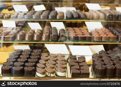 Chocolates on booth. Chocolate shop
