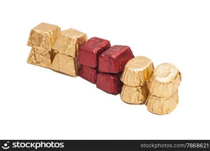 chocolates wrapped in foil isolated on white background