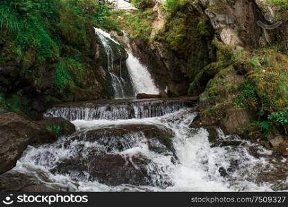 Chodor Waterfall at Lake Teletskoye in the Altai Mountains. Choodor Waterfall at Lake Teletskoye