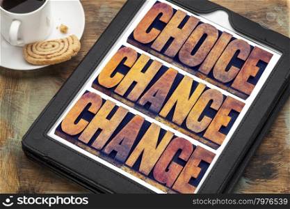 choice, chance and change word abstract - 3 Cs in life concept - text in letterpress wood type printing blocks on a digital tablet with a cup of coffee