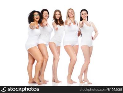 choice, friendship, beauty, body positive and people concept - group of happy different women in white underwear pointing finger on you