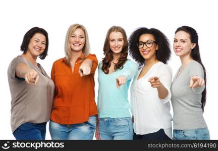 choice, friendship, fashion, diverse people concept - group of happy plus size women in casual clothes pointing finger on you