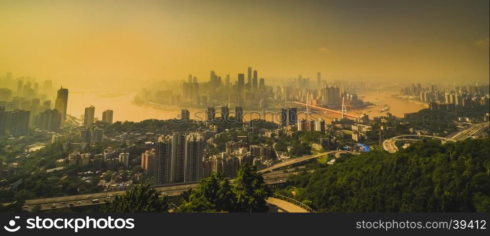 Chongqing, China downtown city skyline over the Yangtze River.