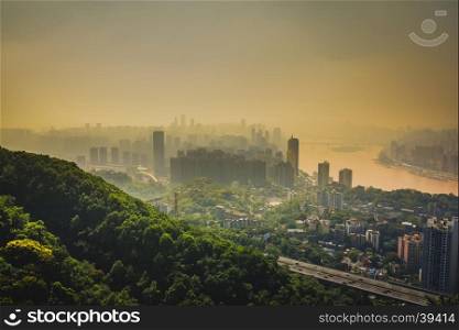 Chongqing, China downtown city skyline over the Yangtze River.