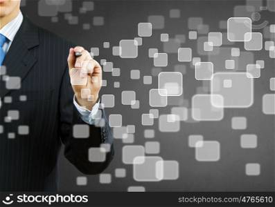Choosing icon . Businessman hand touching icon of media screen