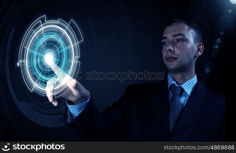 Choosing icon. Close up of businessman pushing icon on media screen