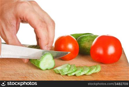 chop tomatoes and cucumbers isolated on white background