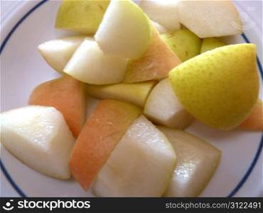 chopped pear on a white plate