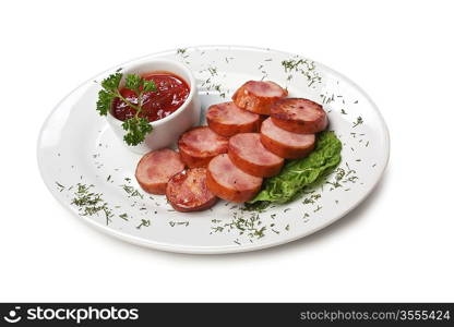 chopped sausages fried with vegetables and spices isolated on white background