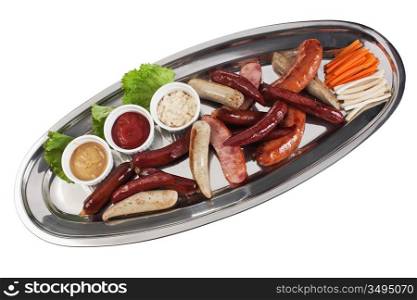 chopped sausages vegetables and spicess isolated on white background