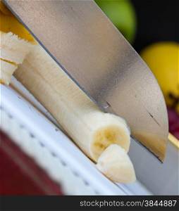 Chopping Banana Showing Fruit Skin And Tropical