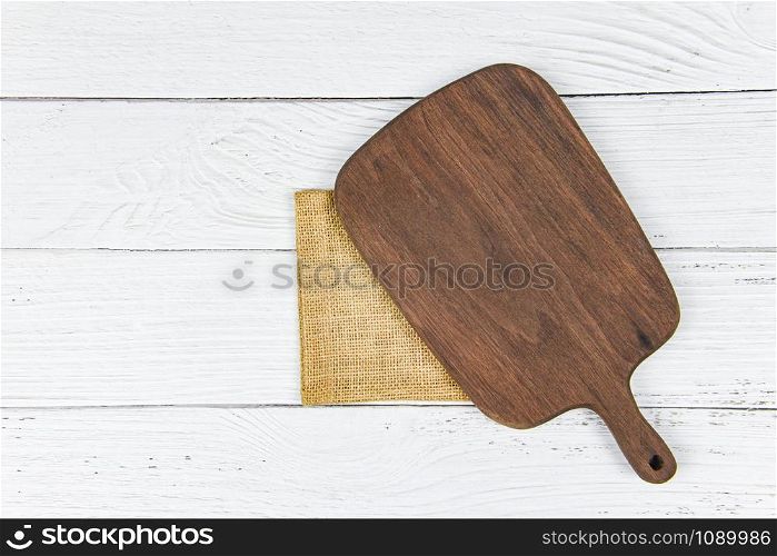Chopping board natural kitchen tools wood products / Kitchen utensils with wooden cutting board background , top view