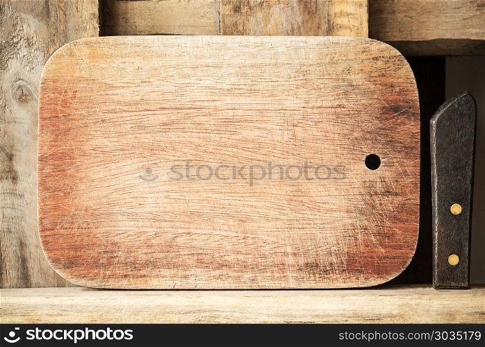 Chopping cutting board block on wooden texture background