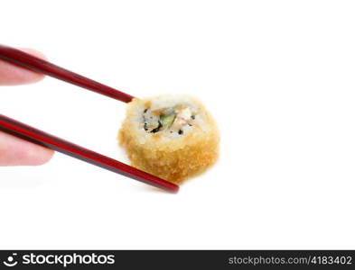 chopsticks holding sushi against pure white background