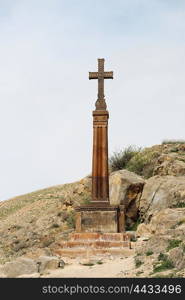 Christian cross near ancient monastery Khor Virap in the mountains of Armenia. Was founded in years 642-1662.