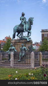 Christian V statue in Kongens Nytorv, King’s New Square, in Copenhagen by day, Denmark. Christian V statue in Kongens Nytorv, King’s New Square, in Copenhagen, Denmark