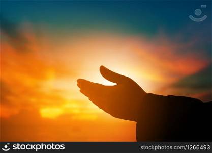 Christian woman praying worship at sunset. Hands folded in prayer. worship god with christian concept religion. Eucharist Therapy Bless God Helping Repent Catholic Easter Lent Mind Pray.