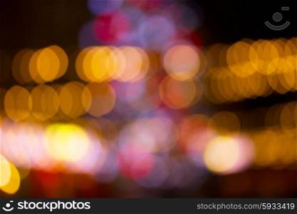 christmas abstract yellow, red and blue lights bokeh defocused background