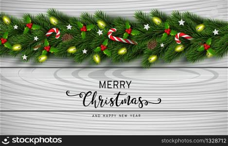 Christmas and happy New Year garland and border of realistic looking Christmas tree branches decorated