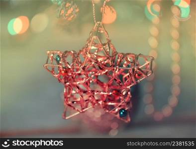 Christmas and New Year branch. Christmas gold star on fir branches.. Christmas gold star decoration ornament background
