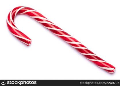 Christmas and New Year concept - sweet Christmas caramel stick isolated on white background. High quality photo. Christmas and New Year concept - sweet Christmas caramel stick isolated on white background