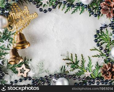 Christmas and New Year decorations lying on the table. Place for Your congratulatory note. View from above, close-up, indoors, no people. Congratulations for family, relatives, friends and colleagues. Christmas and New Year decorations lying on the table