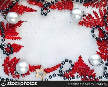 Christmas and New Year decorations lying on the table. Place for Your congratulatory note. View from above, close-up, indoors, no people. Congratulations for family, relatives, friends and colleagues. Christmas and New Year decorations lying on the table